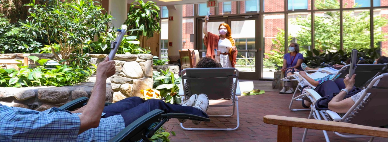 patients sitting in a garden