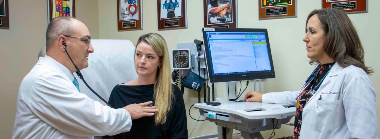 doctor checking on a patient