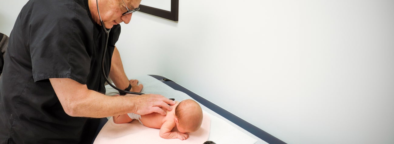 baby getting examined