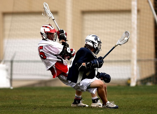 Lacrosse Players on a Field. Nutrition in Young Athletes Blog