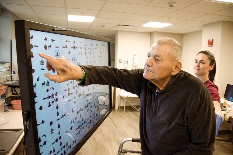 elderly man doing a test