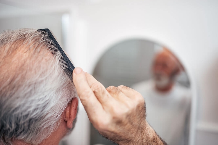 a man combing his hair