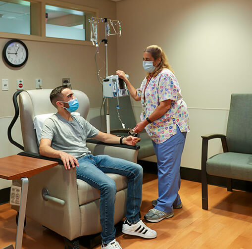 nurse treating a patient