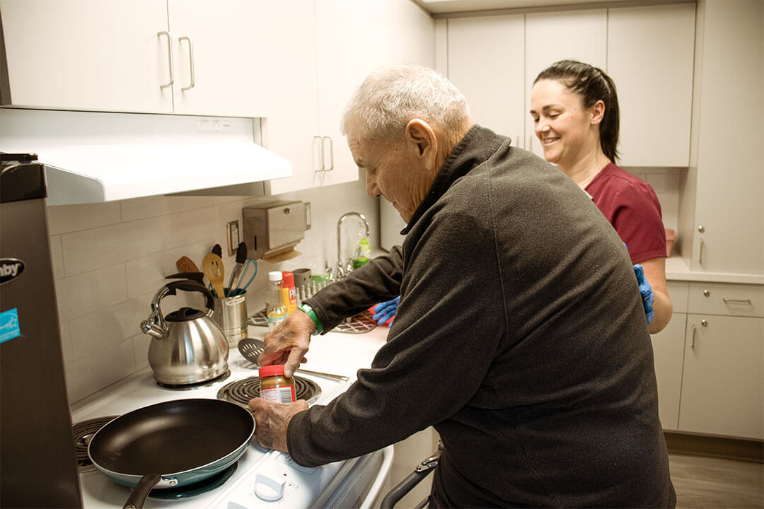 patient cooking in the kitchen