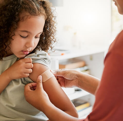 child getting a bandaid