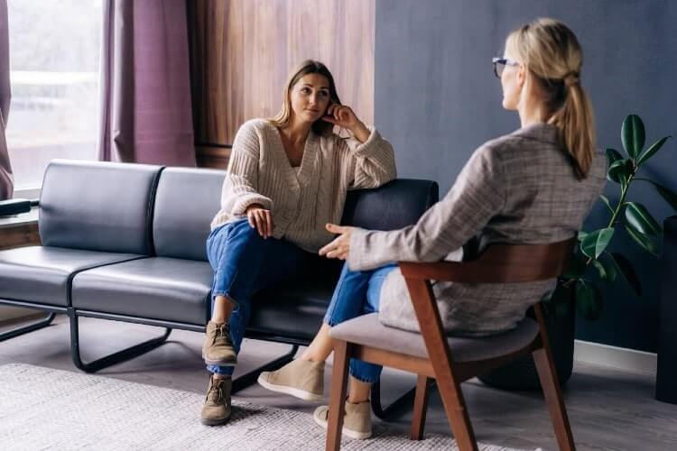 two women in a discussion