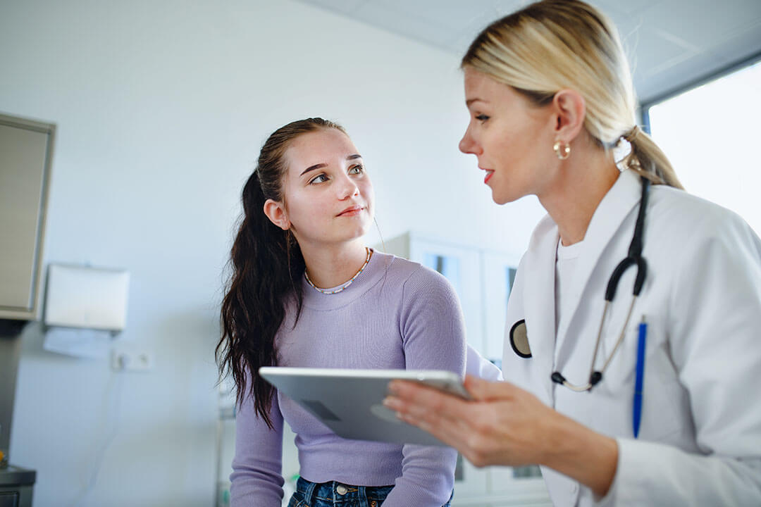 doctor talking to patient